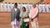Indian Prime Minister Narendra Modi, right, stands with Nepalese Prime Minister Khadga Prasad Oli and his wife Radhika Shakya during a ceremonial reception for Oli in New Delhi, India, Saturday, April 7, 2018. 