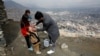 FILE - A boy receives polio vaccination drops during an anti-polio campaign in Kabul, Afghanistan, March 14, 2018.