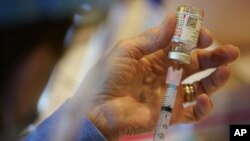 Kompanija je saopštila da cjepivo koje se sastoji iz dvije doze, generiše antitijela i neutralizuje virus kod djece. (Foto: AP/Matt Slocum)