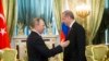 FILE - Russian President Vladimir Putin, left, speaks to Turkey's President Recep Tayyip Erdogan during their meeting in the Kremlin in Moscow, Russia, March 10, 2017. 