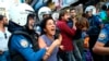 FILE - Turkish police officers arrest protesters, gathered to offer support to workers that were arrested early Saturday for protesting over labor conditions at Istanbul's new airport, in Istanbul, Sept. 15, 2018.