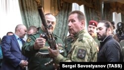 Russia -- Viktor Zolotov (2nd R), Russia's National Guard head, attends a presentation of military equipment for National Guard in Balashikha, Moscow region, February 10, 2017