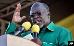 FILE - In this Oct. 23, 2015, photo, Tanzania President John Magufuli addresses a rally in Dar es Salaam, Tanzania.