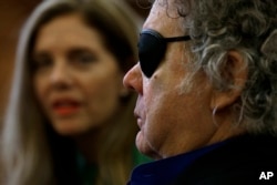 Glass artist Dale Chihuly, right, sheds a tear as he and his wife Leslie, left, talk about his struggle with mental health in his private studio in Seattle, March 22, 2017.