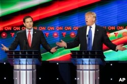 Donald Trump y el senador por Florida Marco Rubio, durante un debate de las primarias en la Universidad de Houston por la candidatura presidencial republicana. Feb. 25, 2016.