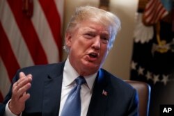 El presidente de EE.UU., Donald Trump, durante una reunión de gabinete en la Casa Blanca. Junio 21, 2018.