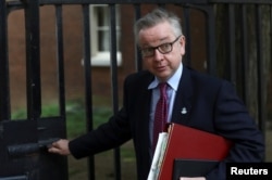 FILE - Britain's Secretary of State for Environment, Food and Rural Affairs Michael Gove leaves 10 Downing Street in London, May 22, 2018.