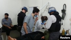 Los expertos de ONU visitaron un hospital improvisado en el suburbio de Damásco donde se produjo el presunto ataque con armas químicas.