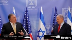 El secretario de Estado de EE. UU., Mike Pompeo, y el primer ministro israelí, Benjamin Netanyahu, pronuncian declaraciones conjuntas durante su reunión en Jerusalén, el 20 de marzo de 2019.