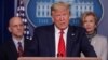 El presidente de EE.UU., Donald Trump, acompañado del comisionado de la FDA, Stephen Hahn, y Deborah Birx, quien lidera el grupo operativo de la Casa Blanca que gestiona la lucha contra el coronavirus, durante una rueda de prensa celebrada el 19 de marzo de 2020.