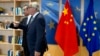 European Commission President Jean-Claude Juncker (R) speaks with China's Foreign Minister Wang Yi prior to a meeting at EU headquarters in Brussels, June 1, 2018, as the two sides deepen ties on trade and investment.