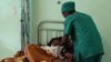FILE - A person is treated, at a public hospital in Antananarivo, Madagascar. 