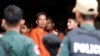 រូបឯកសារ៖ លោក រ៉ាត់ រត្នមុនី សកម្មជន​សិទ្ធិ​ពលករ និង​អ្នក​បក​ប្រែ​សម្រាប់​ការ​ផលិត​ភាពយន្ត​ឯកសារ «ម្តាយ​ខ្ញុំលក់ខ្ញុំ‍» បាន​មក​ដល់​តុលាការរាជធានីភ្នំពេញ ដើម្បី​ការ​ជំនុំ​ជម្រះ​ក្តី​ នៅ​រាជធានីភ្នំពេញ កាលពីថ្ងៃទី៣០ ខែឧសភា ឆ្នាំ២០១៩។ (REUTERS/Samrang Pring)