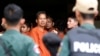 រូបឯកសារ៖ លោករ៉ាត់ រត្នមុនី សកម្មជន​សិទ្ធិ​ពលករ និង​អ្នក​បក​ប្រែ​សម្រាប់​ការ​ផលិត​ភាពយន្ត​ឯកសារ «ម្តាយ​ខ្ញុំលក់ខ្ញុំ‍» បាន​មក​ដល់​តុលាការរាជធានីភ្នំពេញ ដើម្បី​ការ​ជំនុំ​ជម្រះ​ក្តី​ នៅ​រាជធានីភ្នំពេញ កាលពីថ្ងៃទី៣០ ខែឧសភា ឆ្នាំ២០១៩។ (REUTERS/Samrang Pring)
