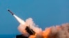 FILE - German soldiers fire the Patriot weapons system at the NATO Missile Firing Installation, in Chania, Greece, Nov. 8, 2017. The Pentagon says the U.S. aims to move a Patriot missile battery into the Middle East region to counter threats from Iran. 