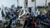 Apoiantes do partido Movimento Democrático de Moçambique (MDM) em campanha 