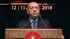 Turkey's President Recep Tayyip Erdogan delivers a speech in Ankara, Turkey, Dec. 12, 2018. Erdogan said Turkey will begin "within a few days" a new military operation to drive out U.S.-backed Syrian Kurdish fighters in Syria, east of the Euphrates River.