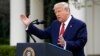 FILE - President Donald Trump speaks during a coronavirus task force briefing in the Rose Garden of the White House, March 29, 2020.