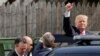 Republican U.S. presidential candidate Donald Trump waves after meeting with House Republican members in Washington, July 7, 2016.