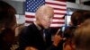 FILE - Former Vice President and Democratic presidential candidate Joe Biden greets audience members during a rally in Cedar Rapids, Iowa, April 30, 2019.