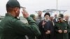 A handout picture made available by the Iranian presidential office on Feb. 2, 2024, shows Iranian President Ebrahim Raisi visiting the Islamic Revolutionary Guard Corps navy base in Bandar Abbas, Iran. (Iranian presidential office via AFP)