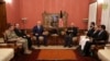 FILE - Afghanistan's President Ashraf Ghani, right, and U.S. special envoy for peace in Afghanistan, Zalmay Khalilzad, left, meet in Kabul, Nov.10, 2018. 
