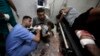 Palestinians wounded in the Israeli bombardment of the Gaza Strip receive treatment at the Nasser hospital in Khan Younis, Southern Gaza Strip, Jan. 22, 2024. 