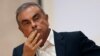 FILE - In this Sept. 29, 2020, file photo, former Nissan Motor Co. Chairman Carlos Ghosn holds a press conference at the Maronite Christian Holy Spirit University of Kaslik, as he launches an initiative to help Lebanon that is undergoing a severe…