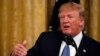 President Donald Trump pauses while speaking during an event about the environment in the East Room of the White House, July 8, 2019.