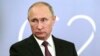 FILE- Russian President Vladimir Putin speaks to the media after the G-20 summit in Buenos Aires, Argentina, Dec. 1, 2018.