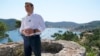 FILE - Greek Prime Minister Alexis Tsipras delivers a speech from the western Greek island of Ithaca, Aug. 21, 2018.