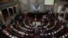 FILE - Congress members are seen taking a vote, in Guatemala City, Guatemala, Sept. 11, 2017. The U.S. announced new visa restrictions on Dec. 11, 2023, for hundreds of Guatemalan lawmakers, other leaders and their families.