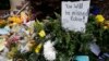A makeshift memorial for actor Robin Wlliiams is shown outside a home which was used in the filming of the movie "Mrs. Doubtfire", Aug. 15, 2014, in San Francisco. Authorities said Williams committed suicide. 
