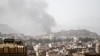 Smoke rises after an airstrike in Sanaa, Yemen, March 22, 2018.