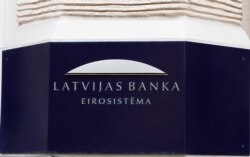 Latvian central bank sign is seen on the bank's headquarters in Riga, April 9, 2019.