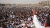 Members of Pakistan's Pashtun community, listen to their leader during a rally against, what they say, are human rights violations, organized by the Pashtun Tahaffuz Movement (PTM) in the southern city Karachi, Pakistan, May 13, 2018. 