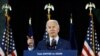 Democratic presidential nominee Joe Biden speaks at a campaign drive-in mobilization event in Flint, Mich., Oct. 31, 2020.