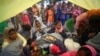 Rohingya refugees, who were on a boat traveling from Myanmar that capsized at Bailakhali beach, wait to transported to a refugee camp from the beach, near Cox's Bazar, Bangladesh, Oct. 31, 2017.