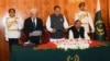 Photo released by the Press Information Department shows President Mamnoon Hussain (C) administers the oath to former Pakistani Chief Justice Nasir-ul-Mulk as Caretaker Prime Minister at the Aiwan-e-Sadr, in Islamabad, Pakistan, June 1, 2018. 