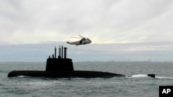 FILE - This 2013 photo provided by the Argentina Navy shows an ARA San Juan, a German-built diesel-electric vessel, near Buenos Aires, Argentina. Argentina's Navy said Friday, Nov. 17, 2017, it has lost contact with its ARA San Juan submarine off the country's southern coast.