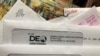 Envelopes from the Florida Department of Economic Opportunity Reemployment Assistance Program are shown, Nov. 5, 2020, in Surfside, Florida.