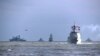 FILE - In this photo released by Xinhua News Agency, Chinese and Russian warships take part in a joint naval drills in the East China Sea, Dec. 27, 2022. China’s Defense Ministry, announced on Sept. 9. 2024, joint naval and air drills with Russia starting this month.