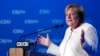 German Chancellor Angela Merkel gestures during her speech at a state election campaign in Munich, Germany, Sept. 24, 2021, two days before Sunday's general election. 