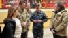 Argentine President Javier Milei, accompanied by Defense Minister Luis Petri visits an area affected by a severe electrical storm, in Bahia Blanca, Argentina, Dec. 17, 2023 in this handout image. (Argentine Defense Ministry/Handout via REUTERS)