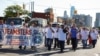 FILE - Teamsters union members march in the annual Labor Day Parade in Detroit, Michigan, on Sept. 2, 2024. The union announced on Sept. 18 that it would not endorse either of the major candidates for president in the U.S. election.