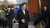 South Korean opposition leader Lee Jae-myung leaves the Seoul National University Hospital in Seoul on Jan. 10, 2024.