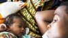 Two babies in the MSF primary health care clinic in Mogadishu, Somalia. (2008)