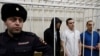 Игорь Сергунин, Алексей Липцер и Вадим Кобзев в судебном заседании по обвинению в участии в экстремистской организации в городе Петушки Владимирской области, Россия, 17 января 2025 года.