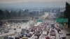 (FILES) Traffic on a Los Angeles freeway during the evening rush hour commute on April 12, 2023 in Alhambra, California.