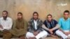 FILE - Iranian border guards purportedly captured by the Pakistani group Jaish al-Adl.